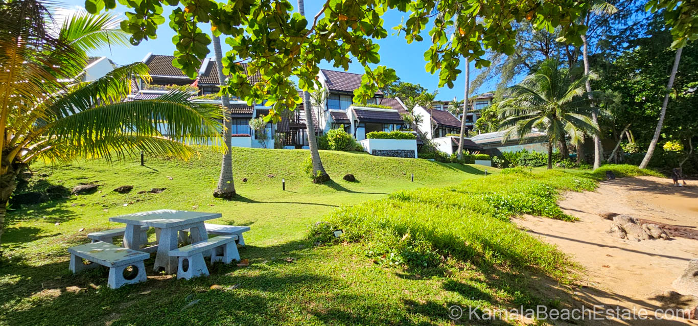 The sea and tropical greenery beside Kamala Beach Estate